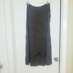 Wrap front maxi skirt with floral eyelet pattern